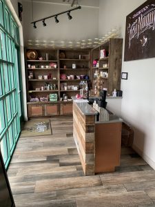 Custom wood shelves and desk by Materia Cabinetry in Orlando